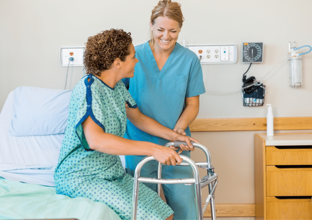 Doctor assisting a patient, undergoing spinal cord injury treatment, who is using a mobility assistive device 